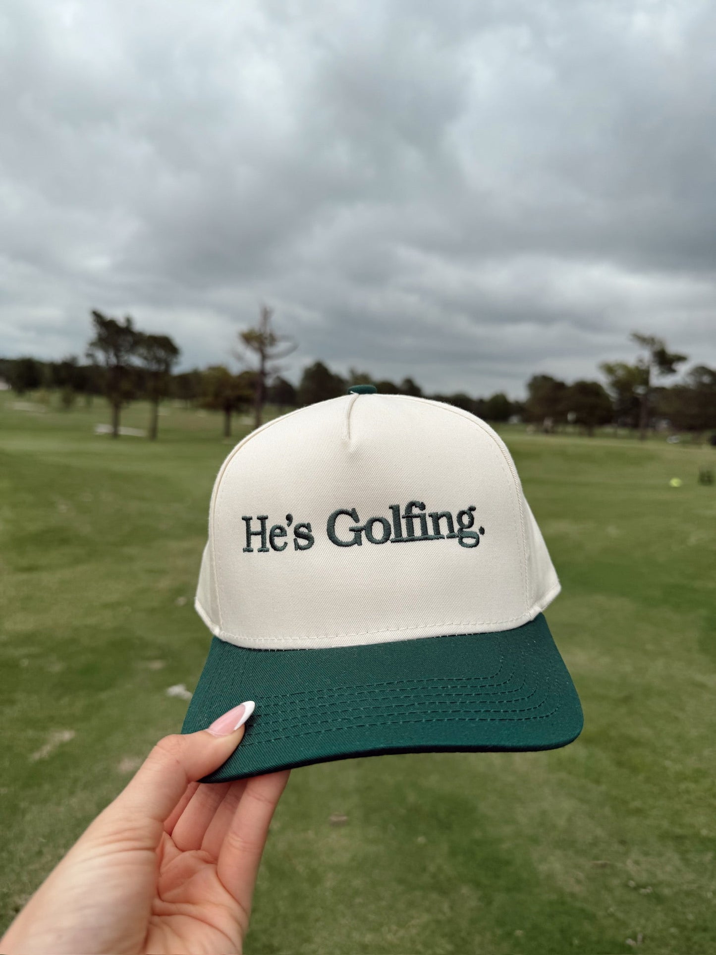 He's Golfing | Green Vintage Trucker Hat