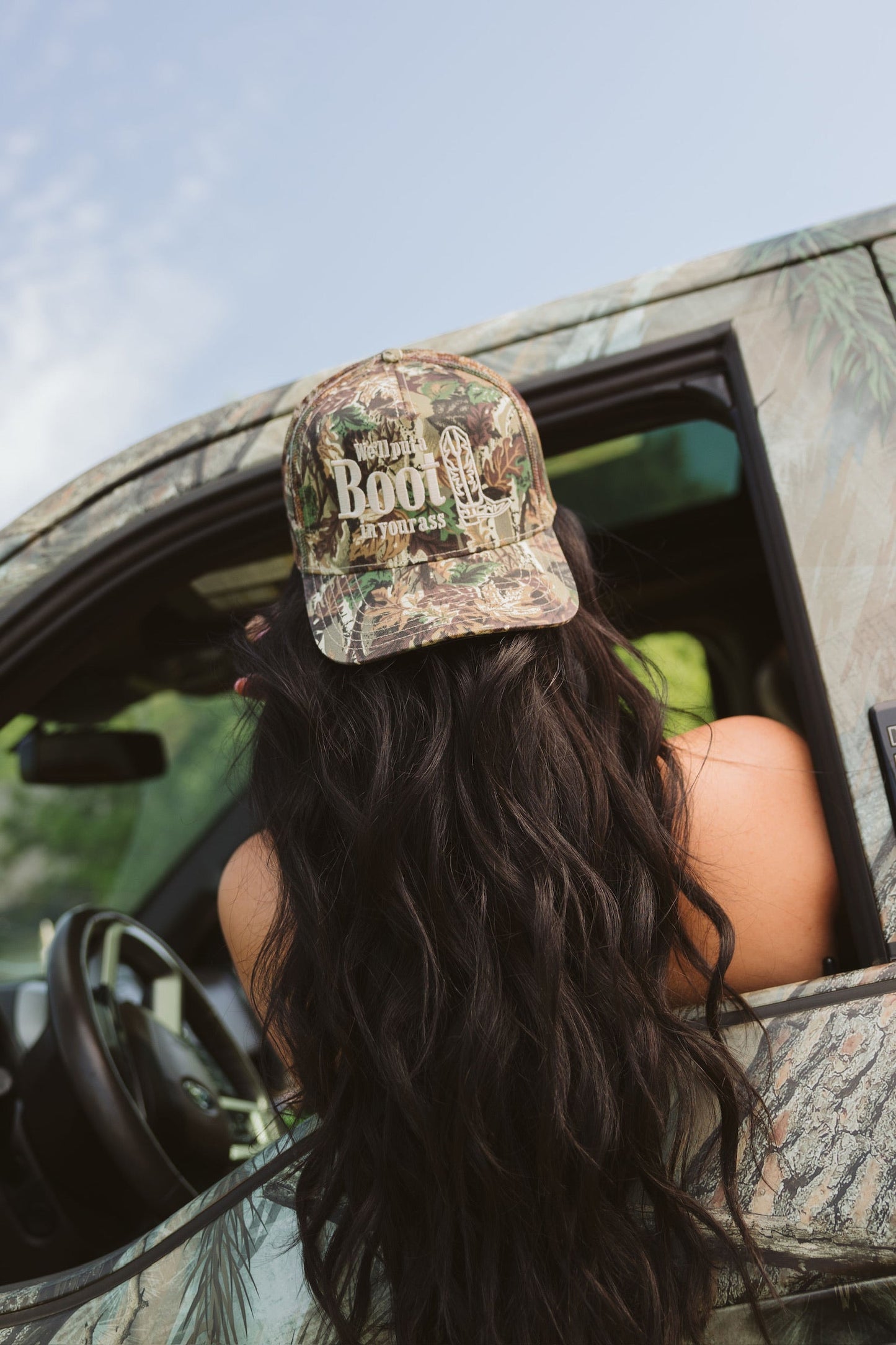We'll Put A Boot in your Ass | Camo Trucker Hat